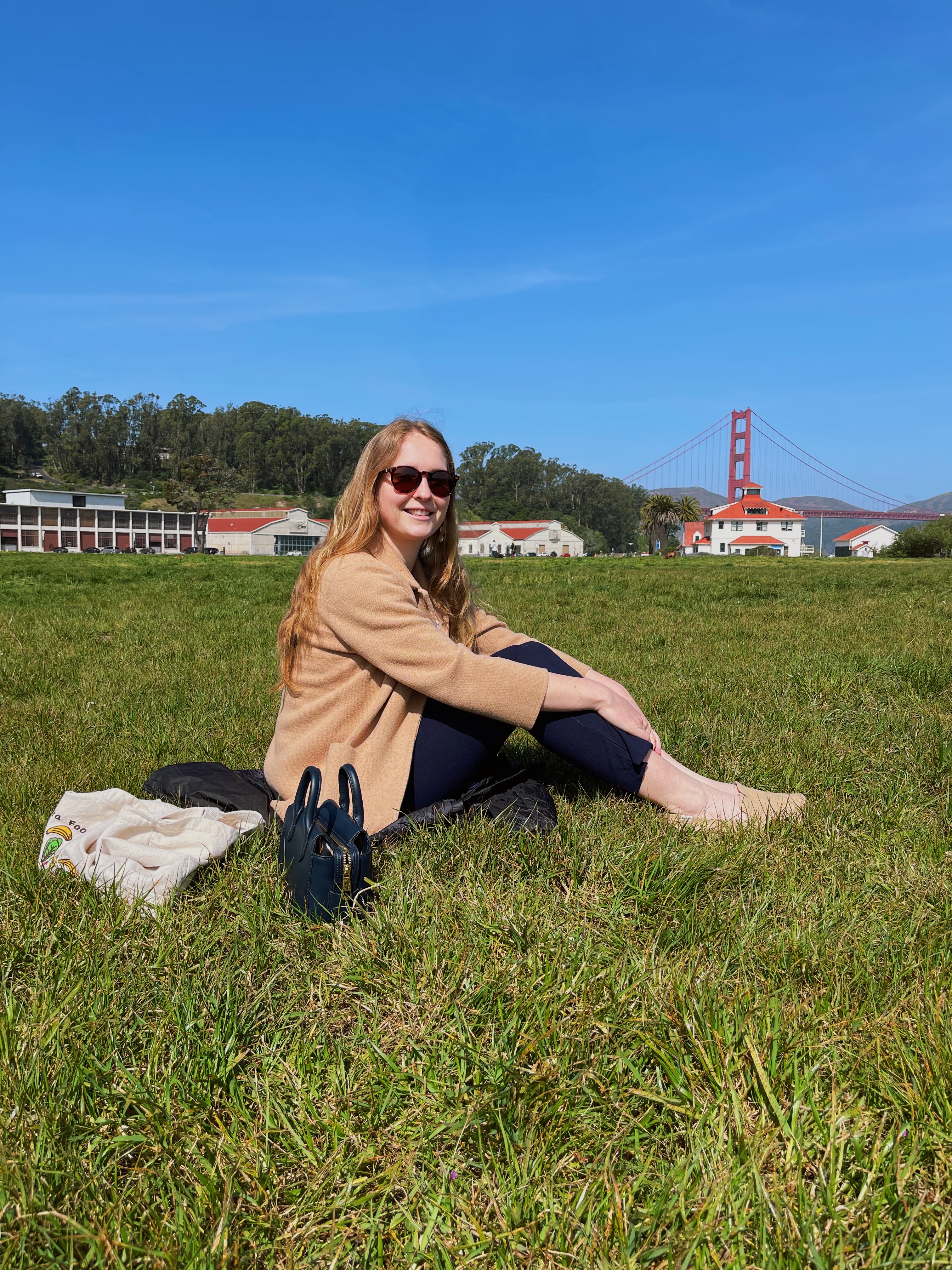 Lily sitting on the grass